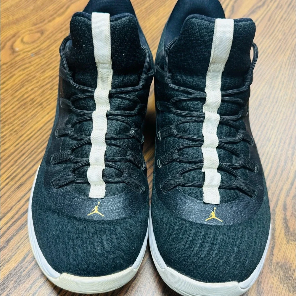 Jordan Men's Black and White Athletic Shoes with Gold Jumpman
